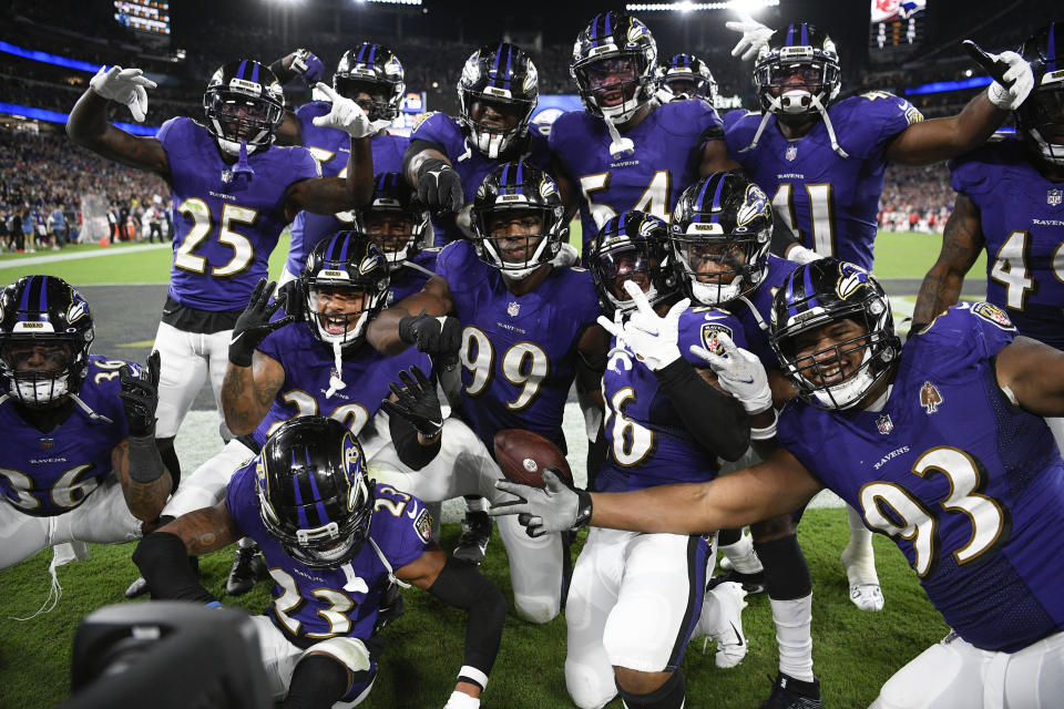 Baltimore Ravens linebacker Odafe Oweh (99) celebrates with teammates after recovering a Kansas City Chiefs fumble in the second half of an NFL football game, Sunday, Sept. 19, 2021, in Baltimore. Baltimore won 36-35. (AP Photo/Nick Wass)