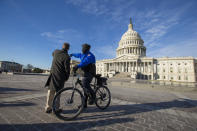 <p>A United States Capitol Police Officer gives directions outside the United States Capitol Building on the morning of Jan. 19, 2018, as Congress works to pass a spending bill by midnight. Failure to do so would shut down the United States government. (Photo: Alex Edelman/CNP via ZUMA Wire) </p>