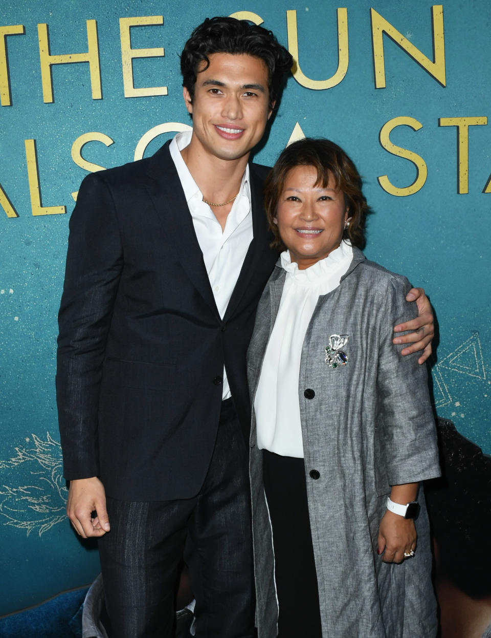 Charles Melton and mom Sukyong Melton attend the World Premiere Of Warner Bros "The Sun Is Also A Star" at Pacific Theaters at the Grove on May 13, 2019 in Los Angeles, California