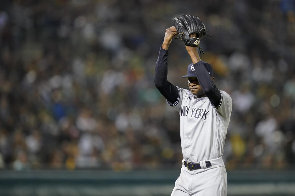 New York Yankees starting pitcher Domingo Germán reacts as he exits a baseball game against the Oakland Athletics during the eighth inning in Oakland, Calif., Saturday, Aug. 27, 2022. (AP Photo/Godofredo A. Vásquez)
