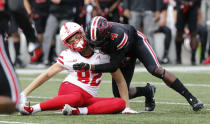 <p>2013 — NCAA passes rule calling for ejection of players flagged for targeting, a change that generally protects offensive players — quarterbacks and receivers especially — and alters the way in which many defenders can tackle without being penalized. (Photo credit: AP) </p>