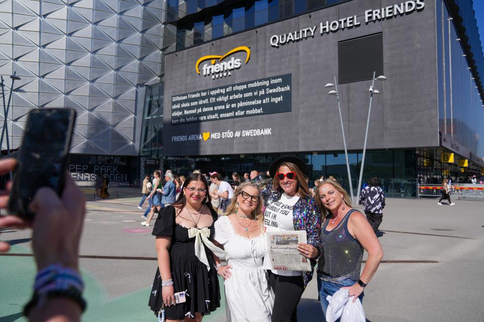 Jennifer Crane (in white) poses in front of Friends Arena with her niece, sister and friend.