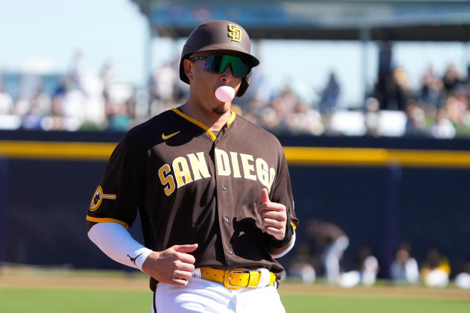 San Diego Padres third baseman Manny Machado (13) runs to third base in the first inning of a spring training game against the Seattle Mariners at Peoria Sports Complex.