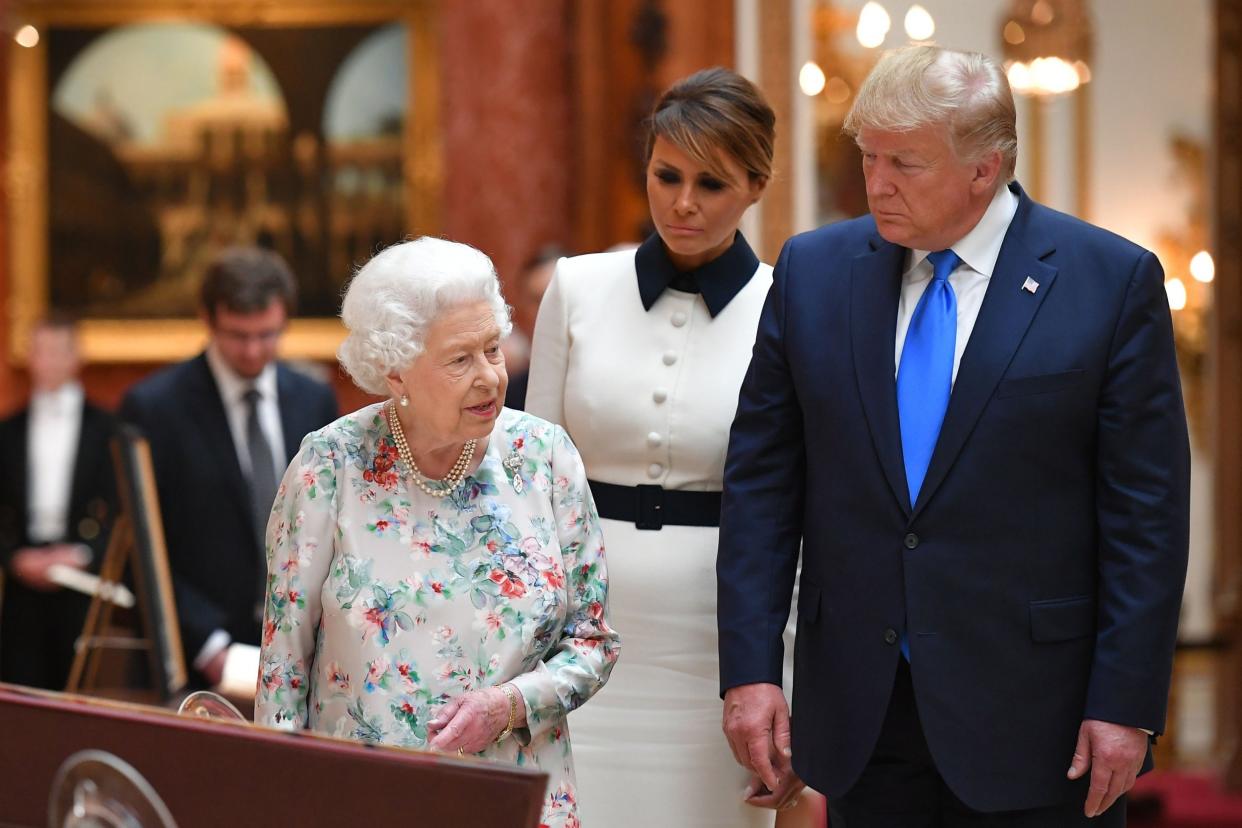 The Queen with the First Lady and Donald Trump: Mandel Ngan/AFP/Getty Images