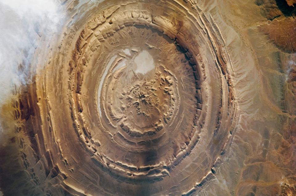 This circular natural feature (the so-called Richat Structure in the Sahara Desert) was once an important prehistoric tool-making and hunting center for Homo erectus (Nasa).