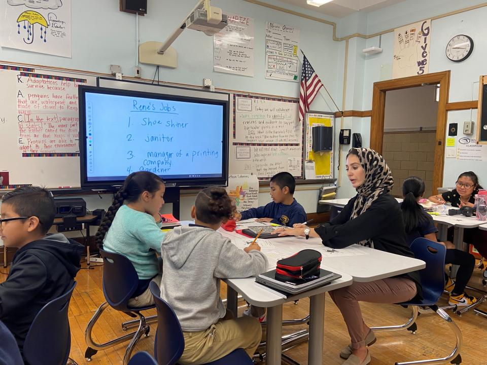 Shereen Jaloudi teaches English to her 4th grade class at Paterson's School 5. “We can’t wait to get out for fresh air,” said Jaloudi. “You leave here exhausted. It takes a toll.”