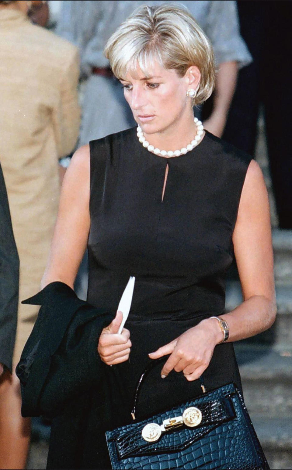 <p>After her holiday, Princess Diana joined celebrities including Elton John and Naomi Campbell at a memorial service in Milan for her friend, fashion designer Gianni Versace<span>. The Italian brand was a go-to label for the Princess, who wore the label's glamorous gowns for many of her public appearances. </span></p>