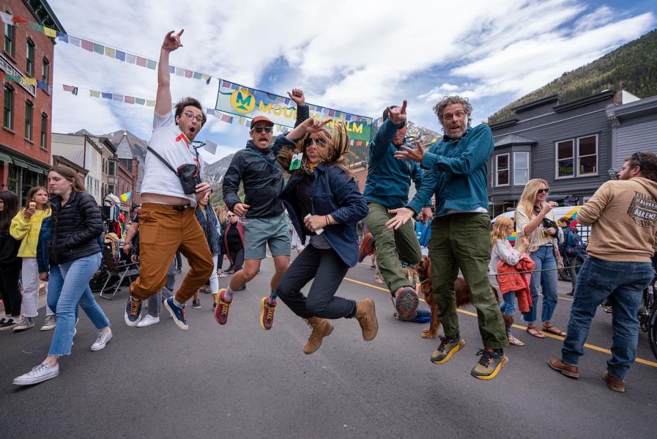 Festivalgoers jumping up at the annual ice cream social at Mountainfilm