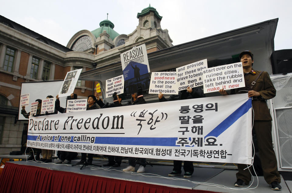 In this photo taken on Dec. 9, 2011, South Korean students shout slogans during a rally denouncing North Korea's alleged genocide and crimes against humanity in Seoul, South Korea. After the war, more than 500 South Koreans were abducted by North Korean agents and have not returned, according to Seoul's Unification Ministry. About 90 percent of them were fishermen. And more than 21,000 North Koreans have defected to the South, Seoul says. (AP Photo/Lee Jin-man)
