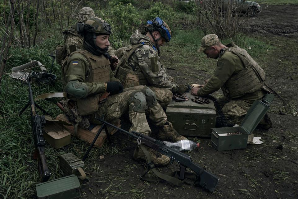 Ukrainian soldiers prepare their ammunition at the frontline positions near Vuhledar, Donetsk region, Ukraine, Monday, May 1, 2023.