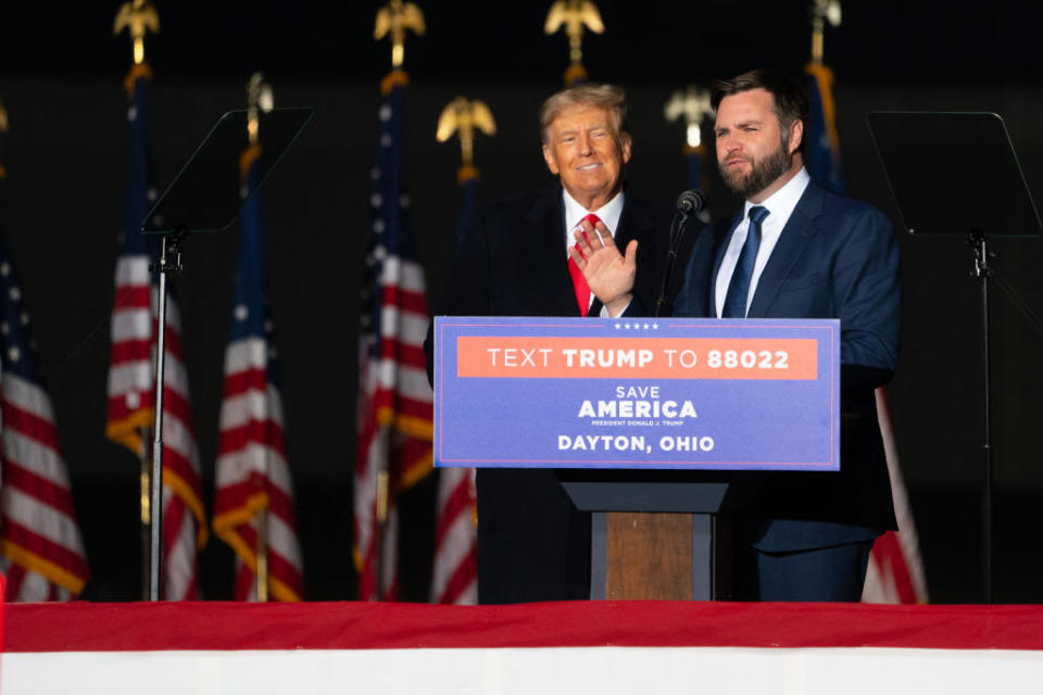 Donald Trump invites J.D. Vance to the stage during a “Save America” rally held in Vandalia, Ohio.