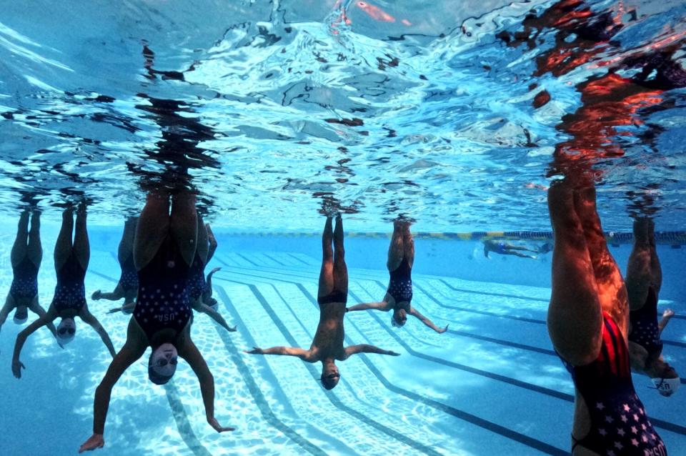 The USA Artistic Swimming team including Kenny Gaudet, center, practice at UCLA.