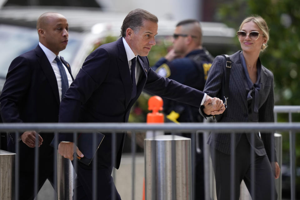 Hunter Biden, center, and his wife, Melissa Cohen Biden, right, arrives at federal court, Monday, June 3, 2024, in Wilmington, Del. (AP Photo/Matt Slocum)