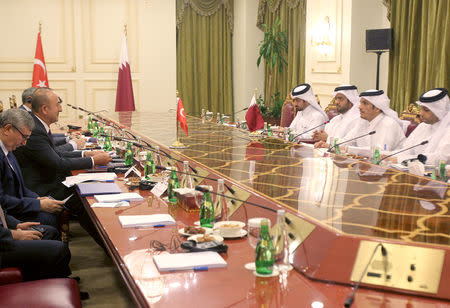 Qatari Foreign Minister Sheikh Mohammed bin Abdulrahman bin Jassim Al-Thani meets with Turkish Foreign Minister Mevlut Cavusoglu during in Doha, Qatar November 1, 2018. REUTERS/Naseem Zeitoon