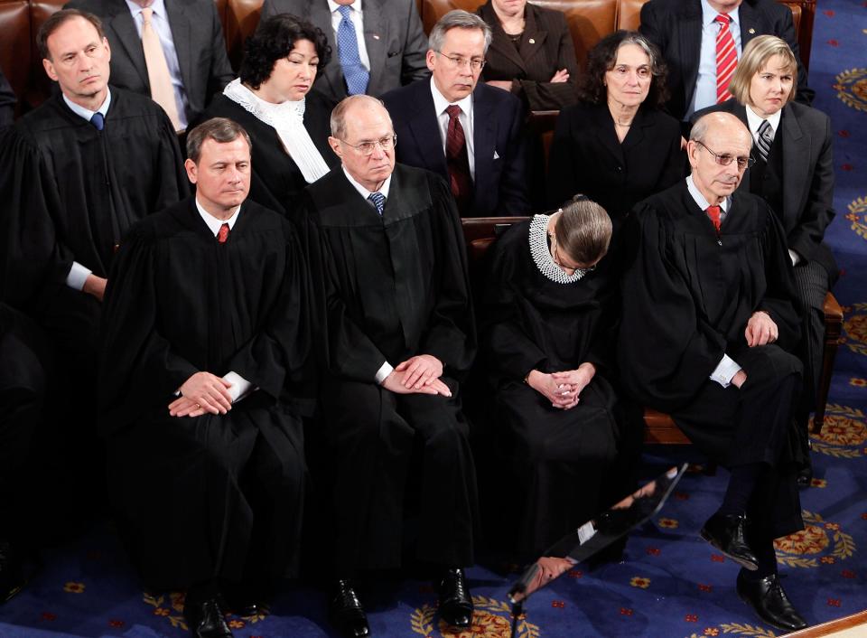 Associate  Justice Ruth Bader Ginsburg appears to dose during President Barack Obama's first State of the Union address at the U.S. Capitol on January 27, 2010, in Washington, D.C. Pictured from the high court are: (L-R, Front) Chief Justice John Roberts and Associate Justices Anthony Kennedy, Ginsburg and Stephen Breyer (L-R, Back)Associate Justices Samuel Alito and Sonia Sotomayor.