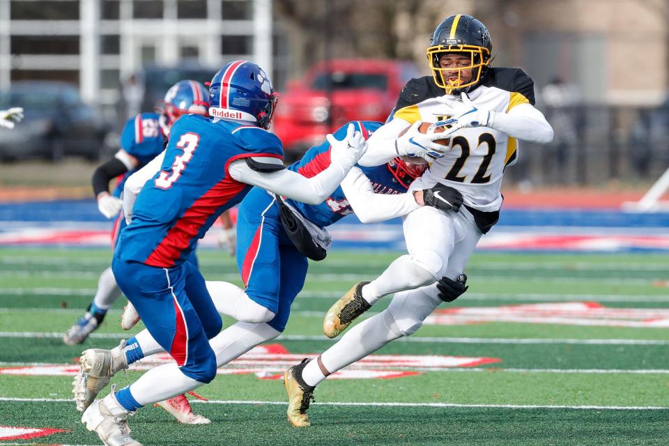 Detroit King wide receiver Jacobe Oglesby runs against Mason during the first half of King's 52-17 win in the Division 3 state semifinal at Westland Glenn High School on Saturday, Nov. 19, 2022.
