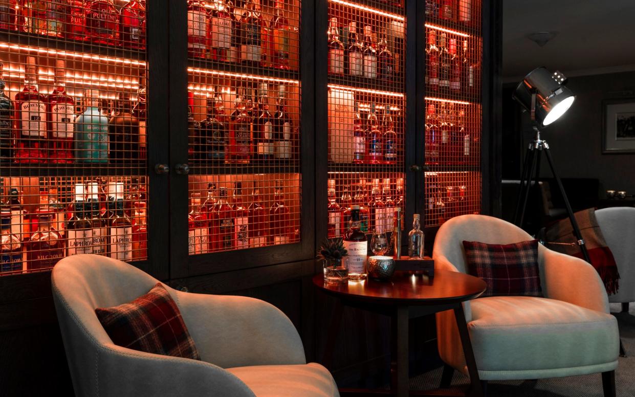 Unwind with a few drams of whisky at The Glasshouse