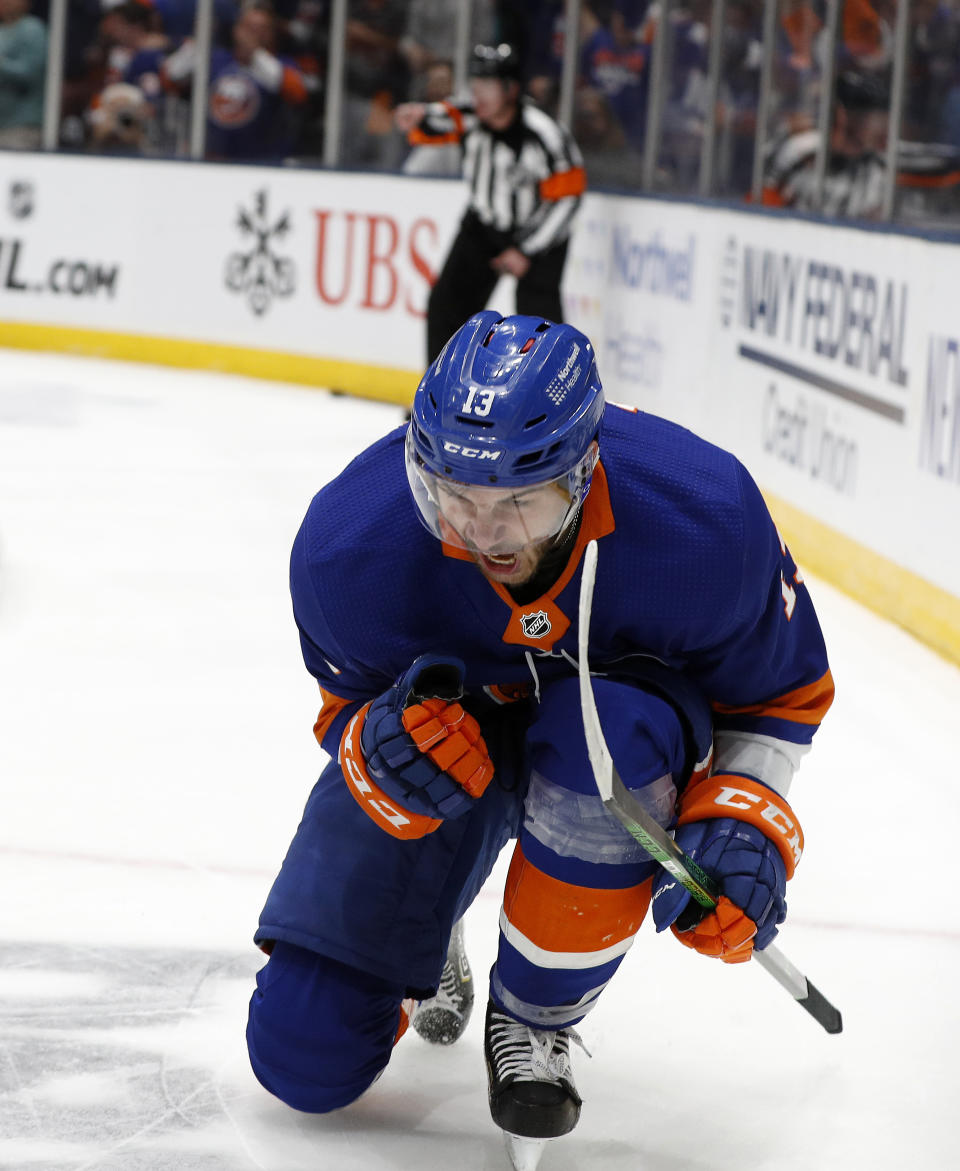 New York Islanders center Mathew Barzal celebrates his goal against the Tampa Bay Lightning in the second period of Game 4 of an NHL hockey Stanley Cup semifinal, Saturday, June 19, 2021, in Uniondale, N.Y. (AP Photo/Jim McIsaac)