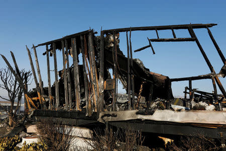 Burned mobile homes are seen at the Monserate Country Club after the Lilac Fire, a fast moving wildfire, swept through their community in Bonsall, California, U.S., December 8, 2017. REUTERS/Mike Blake