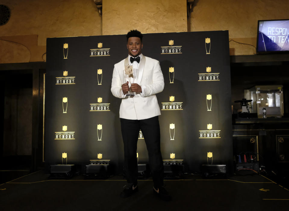 IMAGE DISTRIBUTED FOR THE NFL -Saquon Barkley of the New York Giants poses with the award for AP offensive rookie of the year in the press room at the 8th Annual NFL Honors at The Fox Theatre on Saturday, Feb. 2, 2019, in Atlanta. (Photo by AJ Mast/Invision for NFL/AP Images)