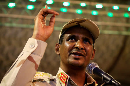 FILE PHOTO: General Mohamed Hamdan Dagalo, head of the Rapid Support Forces (RSF) and deputy head of the Transitional Military Council (TMC) delivers an address after the Ramadan prayers and Iftar organized by Sultan of Darfur Ahmed Hussain in Khartoum, Sudan May 18, 2019. REUTERS/Mohamed Nureldin Abdallah/File Photo