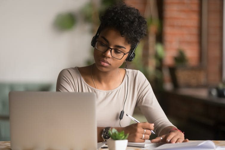 <span class="caption">Online learning can be more accessible and flexible than on-campus teaching.</span> <span class="attribution"><a class="link " href="https://www.shutterstock.com/image-photo/focused-mixed-race-woman-wearing-headphones-1375976735" rel="nofollow noopener" target="_blank" data-ylk="slk:fizkes/Shutterstock;elm:context_link;itc:0;sec:content-canvas">fizkes/Shutterstock</a></span>