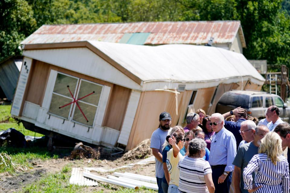 President Joe Biden tours a Lost Creek, Ky., neighborhood impacted by recent flash flooding.