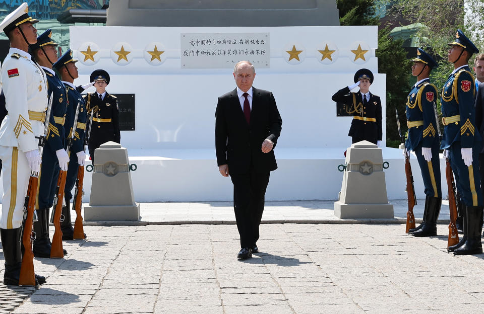 Russian President Vladimir Putin attends a laying flowers ceremony at the Monument to the Soviet soldiers who died in the battles for the liberation of China's northeast from Japanese invaders in Harbin, northeastern China's Heilongjiang Province, on Friday, May 17, 2024. (Alexander Ryumin, Sputnik, Kremlin Pool Photo via AP)