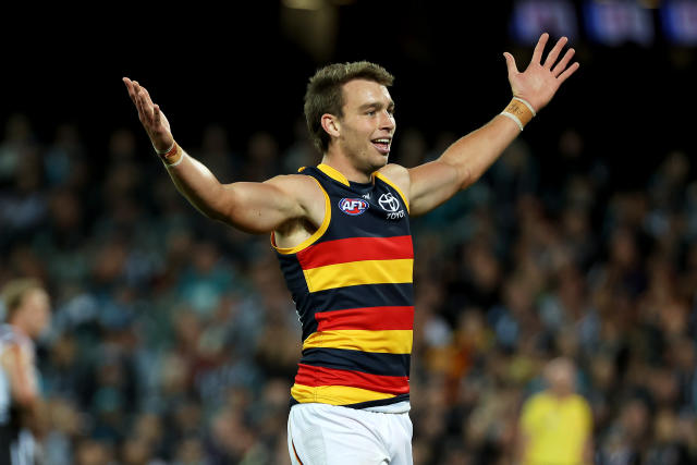 Riley Thilthorpe, pictured here celebrating after kicking a goal for the Crows against the Power.