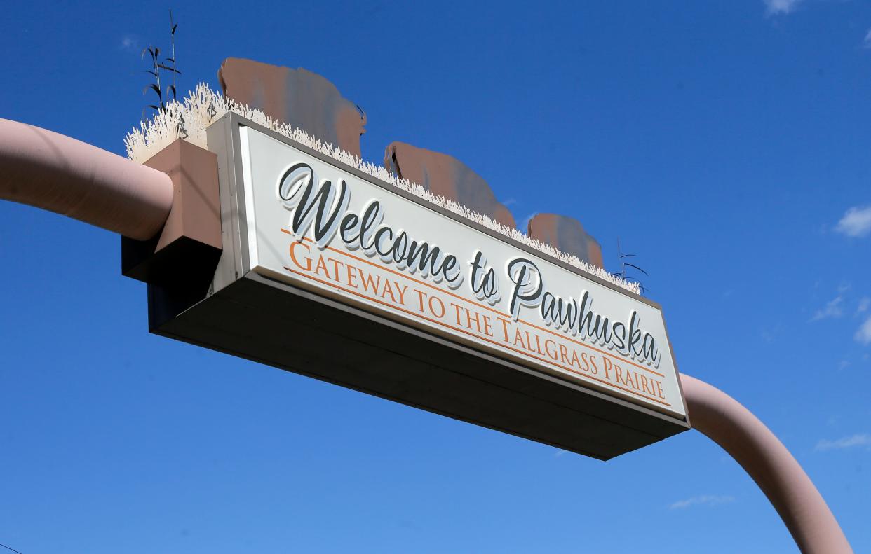 A sign over Kihekah Avenue welcomes travelers to Pawhuska, the capitol of the Osage Nation and seat of Osage County.