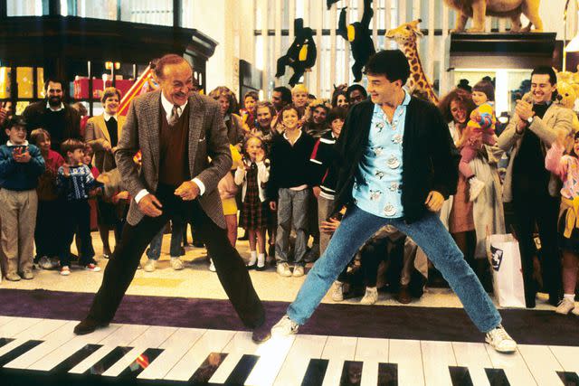 <p>20th Century Fox/Everett Collection</p> Robert Loggia and Tom Hanks in 'Big'