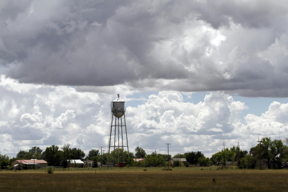 A water tower stands over the county seat of Torrance County, N.M., Sept. 14 , 2022. Republican commissioners in the rural New Mexico county have tried everything they can think of to persuade voters that their elections are secure, and none of it seems to be working. They agreed to hand count ballots from the primary election, allowed the public to observe security testing of ballot machines and tasked their county manager with making sure those efforts ran smoothly. Still, many voters in Torrance County don’t trust voting machines or election results. (AP Photos/Morgan Lee)