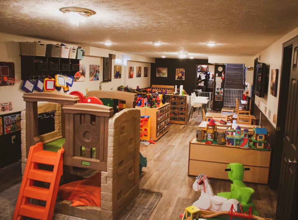 A massive collection of toys, books, games and other assorted activities for children are organized in the basement of Eagle Wings Daycare Home.