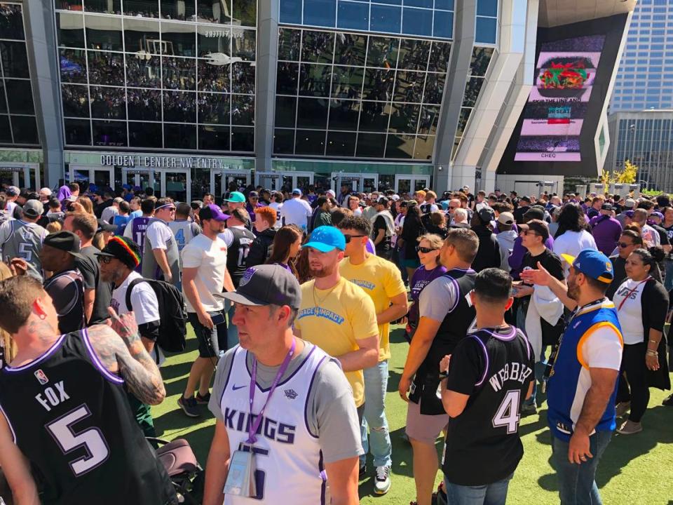 A crowd of fans awaits the Game 1 playoff matchup between the Sacramento Kings and the Golden State Warriors outside Golden 1 Center on Saturday, about two hours before tip off.