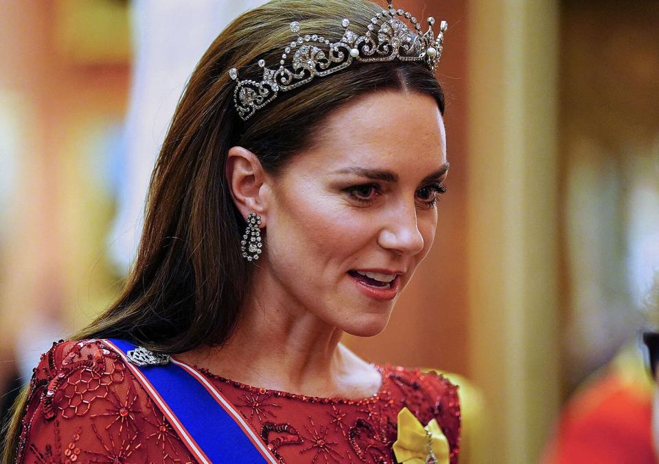 Britain's Catherine, Princess of Wales, speaks to guests during a Diplomatic Corps reception at Buckingham Palace in London on December 6, 2022. (Photo by Victoria Jones / POOL / AFP) (Photo by VICTORIA JONES/POOL/AFP via Getty Images)