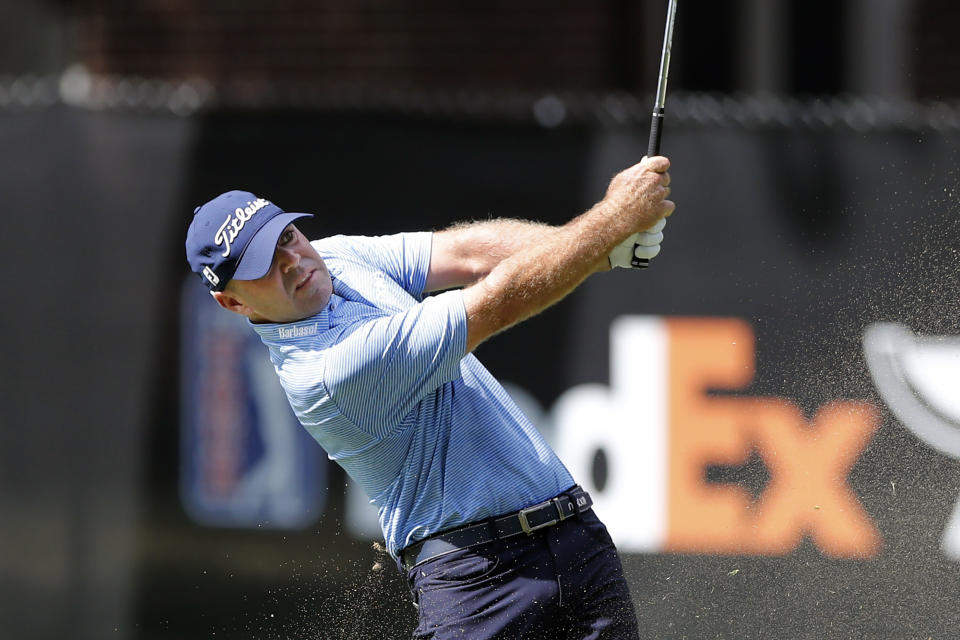 Ryan Armour hits his approach shot on the eighth fairway during the second round of the Rocket Mortgage Classic golf tournament, Friday, July 3, 2020, at the Detroit Golf Club in Detroit. (AP Photo/Carlos Osorio)