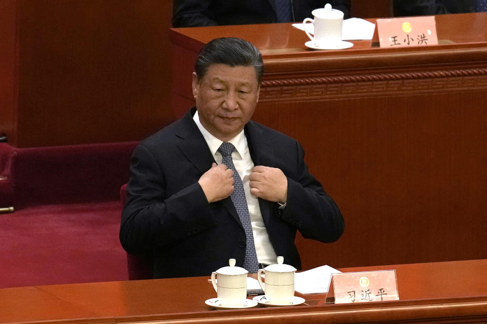 Chinese President Xi Jinping attends the opening session of the Chinese People's Political Consultative Conference in the Great Hall of the People in Beijing, Monday, March 4, 2024. (AP Photo/Ng Han Guan)