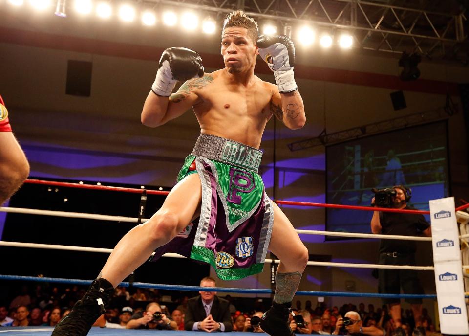 KISSIMMEE, FL - OCTOBER 19: Boxer Orlando Cruz prepares to box at Kissimmee Civic Center on October 19, 2012 in Kissimmee, Florida. (Photo by J. Meric/Getty Images)