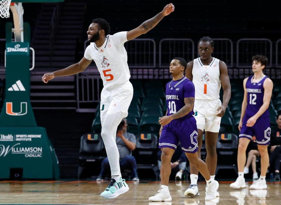 Miami Hurricanes guard Wooga Poplar (5) reacts as the Hurricanes lead the Stonehill Skyhawks in the second half at the Watsco Center in Coral Gables, Florida on Thursday, December 21, 2023.