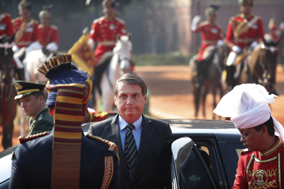 Brazil's President Jair Bolsonaro arrives for his ceremonial reception at the Indian presidential palace in New Delhi, India, Saturday, Jan. 25, 2020. Bolsonaro is this year's chief guest for India's Republic day parade. (AP Photo/Manish Swarup)