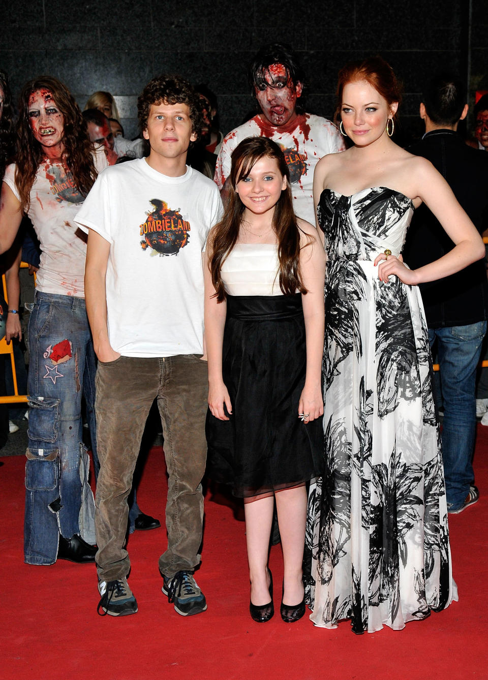 Jesse Eisenberg, Abigail Breslin and Emma Stone attend the European Premiere for "Zombieland" in 2009.