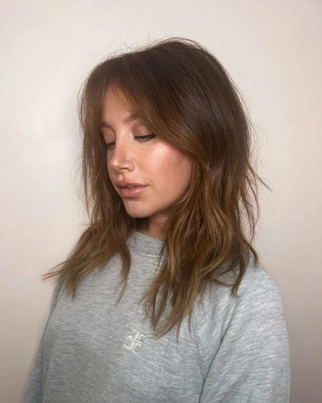 ashley tisdale side swept bangs