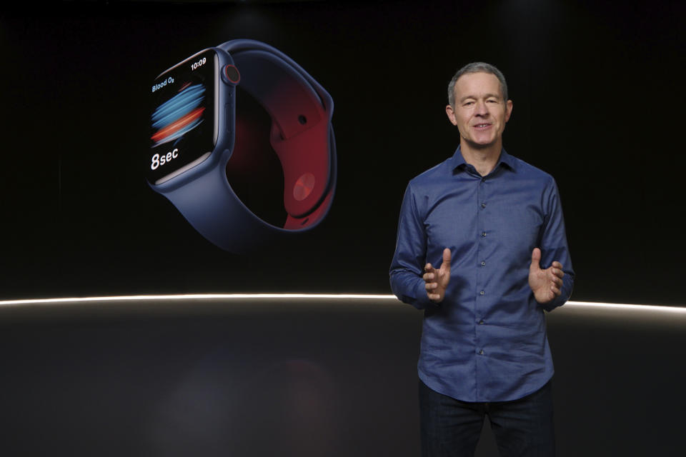 In this still image provided by Apple from the keynote video of a special event at Apple Park in Cupertino, Calif., Apple's Chief Operating Officer Jeff Williams unveils Apple Watch Series 6 on Tuesday, Sept. 15, 2020. Apple is introducing the cheaper version of its smart watch in its latest attempt to broaden the appeal of its trend-setting products while more consumers are forced to scrimp during ongoing fallout from the pandemic. (Apple via AP)