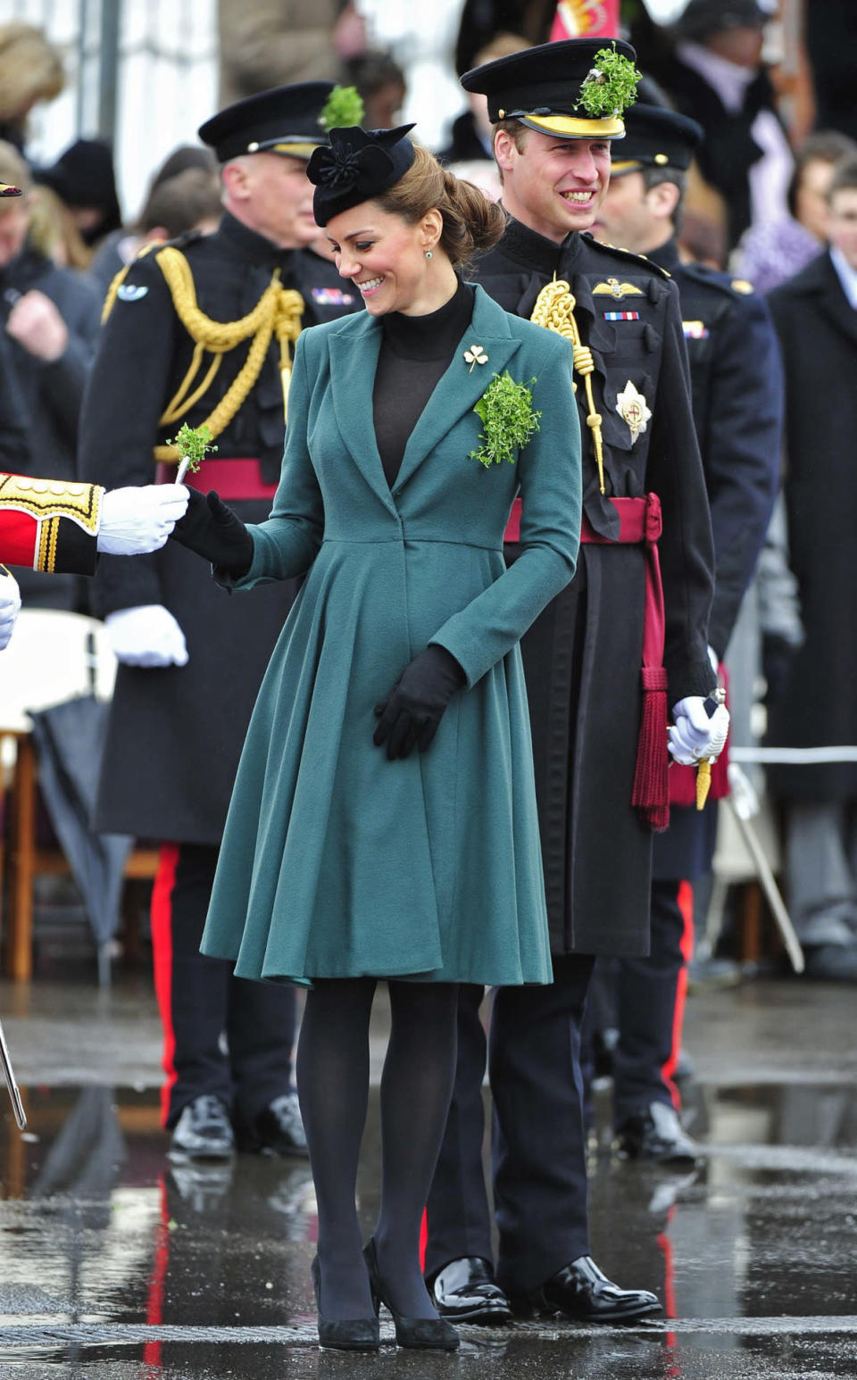 <p>Kate attended a St. Patrick’s Day parade in a dark green Emilia Wickstead coat, a black Lock & Co hat and suede Episode heels. </p><p><i>[Photo: PA]</i></p>