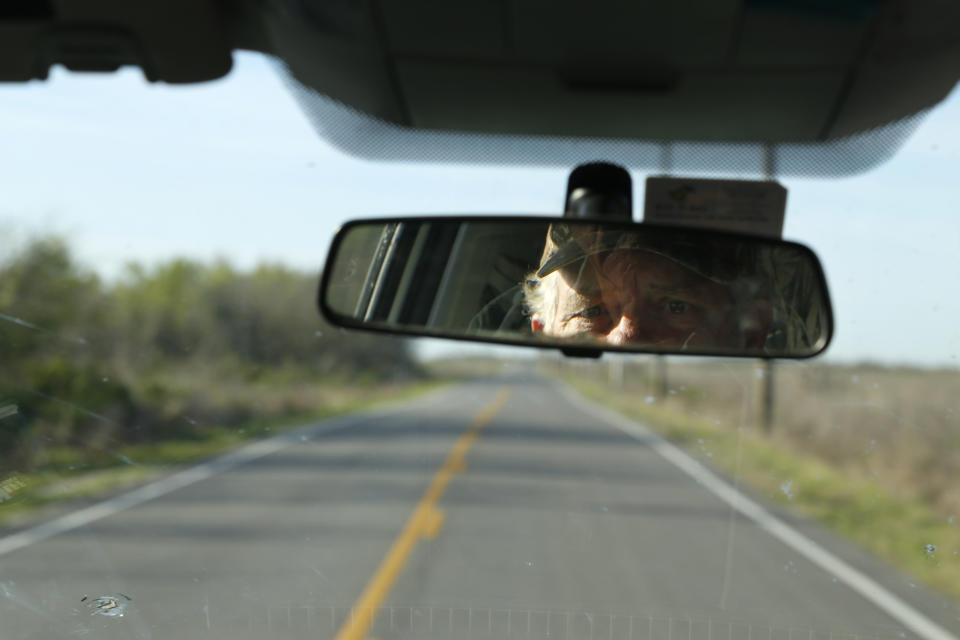 John Allaire drives near his home in Cameron, La., on Friday, April 1, 2022. Allaire, a retired environmental engineer in the oil and gas industry, owns a large swath of rustic oceanside property next to an export facility for liquefied natural gas, or LNG. The gas is converted to liquid so that larger quantities can be sent in ships overseas. Allaire is fighting a proposal to add yet another LNG facility even closer to him. "It'll be a monument to short term planning. And their short term money," he says, "'Let's make it, make it, make it, make it, make it, and then we'll go on to the next thing.'" (AP Photo/Martha Irvine)