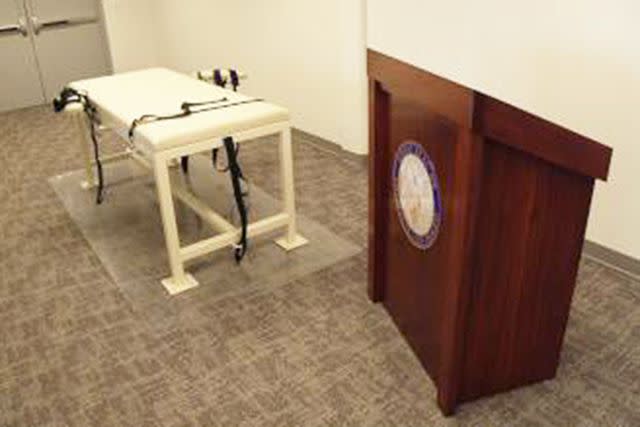 <p>Idaho Department of Corrections</p> Execution table with podium, inside Idaho's death chamber.