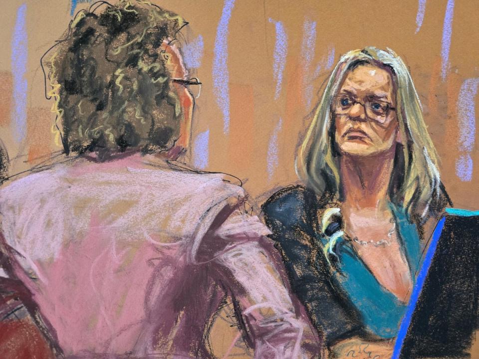A courtroom sketch depicts Stormy Daniels on the witness stand facing questions from Donald Trump’s attorney Susan Necheles on 9 May. (REUTERS)