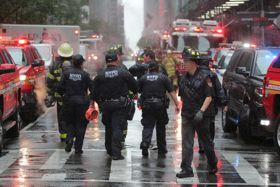 Emergency services first responders arrive at 787 7th Avenue in midtown Manhattan where a helicopter was reported to have crashed in New York City, New York, June 10, 2019. (Photo: Brendan McDermid/Reuters)