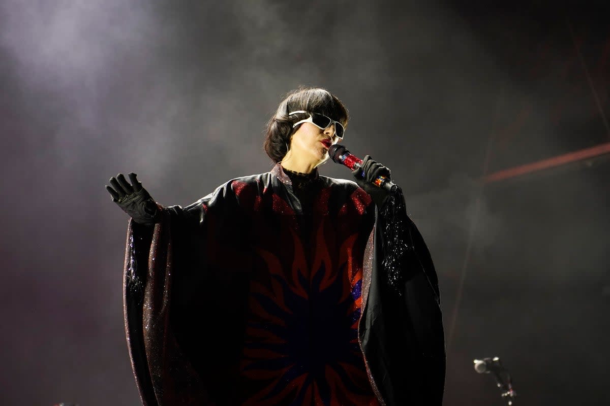 Singer Karen O still has a loaded arsenal of rock-star moves 23 years into the game (Invision)