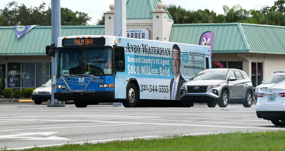 A Space Coast Area Transit bus passes the intersection of West Hibiscus Boulevard and Dr. Martin Luther King, Jr. Boulevard in Melbourne. The county transit agency is finding difficulty in filling openings for bus drivers.